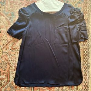 Navy polyester top with pocket and ruched sleeves